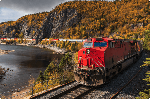 Train driving through hills